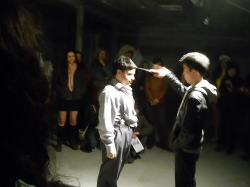 Geraldo takes a light tap on the head with a spatula during the first performance of Bubblegum Bubblegum during the first PERFORMEANDO.