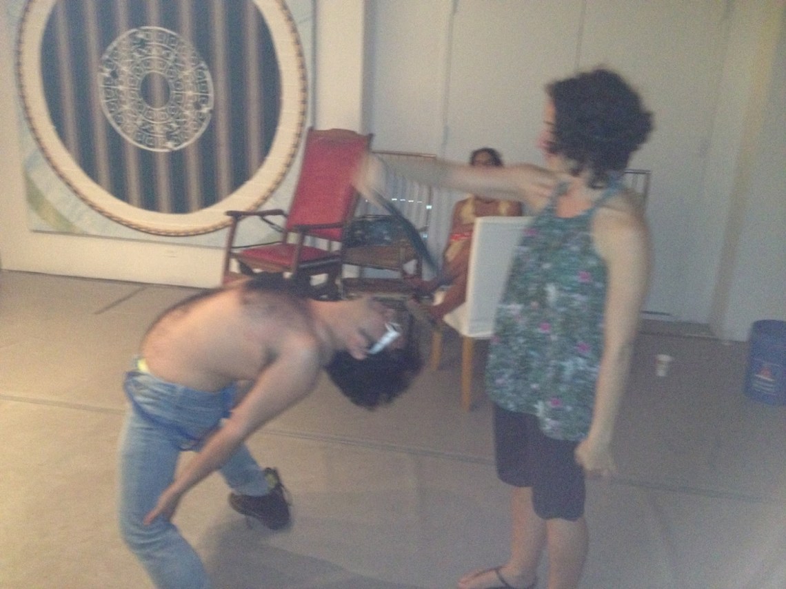 Bending over backwards at John Downing Bonafede's Psychlotron.